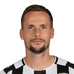 T. Kędziora profile